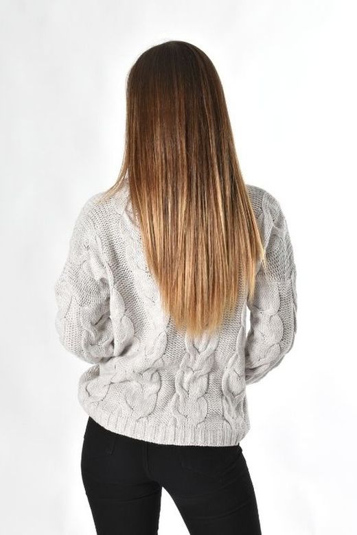 Jersey de mujer trenzado cuello alto