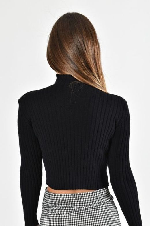 Pull court noir femme